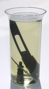 Submerged AR-15 BCG parts in Pristine Cleaning Solution