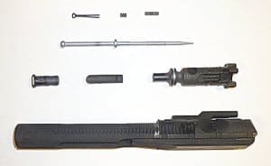 Disassembled AR-15 BCG parts after 45 minutes of submersion in Pristine Cleaning Solution